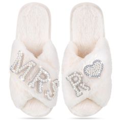 PRICES MAY VARY. Letters Bridal Slippers: our wedding slippers are designed in a variety of letter styles, you can choose your personalized initial slippers, and they are suitable for bridal shower, bridesmaid party, bridal party, also ideal for sleeping, bathing and leisure, comfortable and wear resistant, let you wear the feeling of clouds, white fluff and shining rhinestones can easily match your morning gown, let you shine at any time One Size Fits Most: the bride slippers measure about 9.65 Wedding Slippers For Bride, Wedding Day Letter, Pearl Slippers, Letter Styles, Bridesmaid Slippers, Bridal Slippers, Bride Slippers, Shower Slippers, Fluffy Fabric