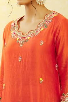 Orange pure spun silk kurta with floral, thread and sequins hand embroidery. Comes with pant and a pure organza shaded dupatta.
Components: 3
Pattern: Hand embroidered
Type Of Work: Floral, Thread, Sequins
Neckline: Round
Sleeve Type: Three quarter
Fabric: Pure spun silk, Dupatta : Pure organza
Color: Orange
Other Details: 
Scalloped detailing on dupatta
Occasion: Mehendi and Haldi,Sangeet - Aza Fashions Luxury Orange Unstitched Suit With Resham Embroidery, Luxury Tussar Silk Kurta With Resham Embroidery, Luxury Silk Kurta With Floral Embroidery, Luxury Multicolor Embroidery Kurta For Spring, Luxury Embroidered Orange Traditional Wear, Affordable Embroidered Sets For Puja, Luxury Kurta With Multicolor Embroidery For Diwali, Luxury Orange Kurta With Resham Embroidery, Diwali Kurta With Zari Work