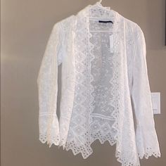 Light Weight Lace Detailed Cardigan. New W/ Tags Elegant White Open Front Top, White Long Sleeve Cardigan For Brunch, White Long Sleeve Brunch Cardigan, Elegant White Cardigan For Daywear, Elegant White Open Front Cardigan, Elegant White Cardigan For Day Out, White Long Sleeve Cardigan, Varsity Cardigan, White Sweater Cardigan