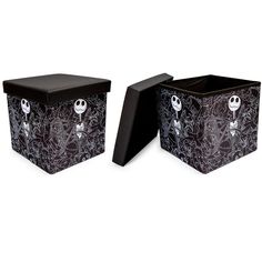 two black boxes with skeletons on them and one has a skeleton face painted on it