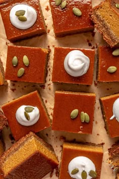 slices of pumpkin pie with whipped cream on top