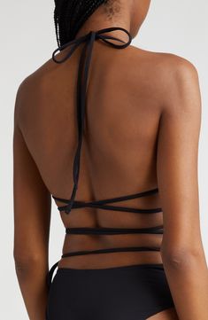 Strappy and sultry, this triangle bikini top keeps your look fresh with a halter neck and waist-wrapping crossover straps. Side tie 92% polyester, 8% elastane Machine or hand wash, line dry Made in Italy Designer Clothing Black Owned/Founded Halter Neck Swimwear With Wrap-around Straps, Poolside Beachwear Cross-tied Halter Top, Black Bra-friendly Halter Top For Poolside, Beachwear Bra-friendly Strappy Halter Top, Black Triangle Top Swimwear With Cross-tied Detail, Halter Neck, Crossover, Nordstrom, Clothes Design