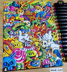 a drawing book with many different colored animals on it