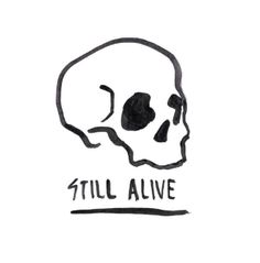 a drawing of a skull with the words still alive