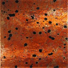 an orange and black painting with dots on it