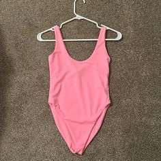 Purchased From Forever 21 Brand Name Hot & Delicious Size Small Light Pink One Piece Bikini That Can Be Worn As A Top As Well Bodysuit Double Lined Completely Sold Out So Get It Here! Spring One-piece Swimming Bodysuit, Summer Sleeveless Leotard For Swimming, Sleeveless Leotard For Swimming In Summer, Summer Backless Leotard, Sleeveless Leotard For Summer Swimming, Summer Poolside Leotard With Lined Body, One-piece Bodysuit For Beach Season, Summer Beachwear Party Leotard, Fitted Solid Bodysuit For Beach Party