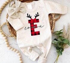 Personalized Baby Romper: Celebrate Your Baby's First Christmas in Style  Your baby's My First Christmas Outfit should be memorable, and our Baby Romper is here to make it unforgettable. <a href="https... My First Christmas Outfit, First Christmas Outfit, Holiday Onesies, Onesie Ideas, Holiday Fits, Christmas Romper, Christmas Monogram, My First Christmas, Baby Christmas Outfit