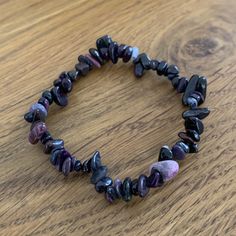 This sugilite bracelet with its beautiful purple color made from semi-precious stones from South Africa is rare. Resembling a mineral version of beetroot, sugilite has a color ranging from purple to light purple. Sugilite is a rare stone also called lavulite. In 1944, while walking on the islet of Iwagi, a few meters from Kyoto, the Japanese geologist Sugi Kenichi discovered this magnificent mineral in an intrusion of aegyrine and syenite. In South Africa, people from Kuruma call it "Wesselite" Transition To Retirement, Purple Natural Stones Beaded Bracelet - Gift, Sugilite Crystal, Elite Shungite, Africa People, Iolite Jewelry, Semi Precious Stone Bracelet, Iolite Crystal, Rare Stone