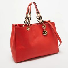 description: This Cynthia tote by Michael Kors is a bag ready to blend in with the busy life of the women of today. Meticulously crafted from leather, it features a red hue and two handles as well as a shoulder strap for you to parade it. The bag is equipped with a spacious nylon-lined interior that has a zip compartment. Complete with gold-tone hardware and their MK charm, this bag will make an ideal buy..gender: Women.includes: The Luxury Closet Packaging, Detachable Strap.Exterior Material: Leather.Interior Material: Nylon.Length: 35 cm.Width: 12 cm.Height: 25 cm.Handle Drop: 15.5 cm.Shoulder Strap: 46 cm adjustable.Hardware: Gold Tone.Origin: China.Condition:.Excellent.In excellent condition with slight darkening on exterior/strap & minor scratches on metal. Red Michael Kors Shoulder Bag With Top Handle, Red Michael Kors Shoulder Bag, Michael Kors Red Bag With Handles, Michael Kors Red Shoulder Bag For Shopping, Heeled Rain Boots, Michael Kors Tote Shoulder Bag With Gold-tone Hardware, High Heel Rain Boots, Michael Kors Tote Bags, Luxury Closet