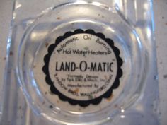 the label for land o matic is displayed in a clear plastic container