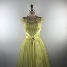 Vintage L 50s S Yellow Illusion Neckline Sweetheart Bust Bow Pleated Skirt Dress. Fits Approximately : Small; No Size Indicated - See Measurements. Bust : 34” Up To 36” With Darts Waist : 26” Bodice Length : 15.5” Overall Length : 45” Pre-Owned. Excellent Condition. Gently Worn. 0059vtg New To Poshmark? Use Code "Shesabettie" For $10 Off Your First Purchase! Pleated Skirt Dress, Soft Gamine, Illusion Neckline, Skirt Dress, Vintage Yellow, Pleated Skirt, Vintage Dresses, Vintage Ladies, Bodice