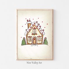 a painting of a gingerbread house with trees and snow on the roof is mounted in a wooden frame