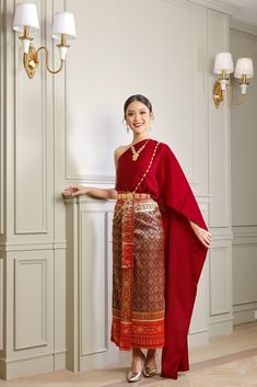 Our beautiful traditional Thai outfits are perfect for weddings, cultural events, Songkran festivals, or any occasion.  They are exclusively handmade with premium Thai silk & handwoven fabric. This set includes: 1 Free Size Silk Sabai Top 1 Free Size Patterned Skirt (can be worn with safety pins or hooks) 1 Set of hooks   This set does not include jewelry or accessories, they are available separately in our store. -- Check out our YouTube videos on how to wear your Thai dress: www.youtube.com/watch?v=jndYR-WrOuE www.youtube.com/watch?v=Eki5aUTxBBI&t=28s -- ชุดไทย, Thai attire, Thai costume, traditional Thailand clothing, that outfit, traditional Thai outfit, traditional Thai clothing, chut Thai, Thai wedding attire, Thai wedding dress, Thai traditional dress, Cambodian dress, Khmer dress, Luxury Traditional Wear With Pallu For Ceremonial Use, Luxury Traditional Wear With Self Design For Puja, Luxury Art Silk Traditional Wear For Ceremonial Occasions, Luxury Chinon Traditional Wedding Wear, Luxury Art Silk Traditional Ceremonial Wear, Luxury Art Silk Traditional Wear For Rituals, Luxury Traditional Wear For Ceremonies, Luxury Traditional Sets For Ceremonial Occasion, Luxury Ceremonial Suits For Festivals