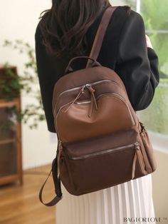 BagForLove - Medium Brown Minimalist Multi-Pocket Backpack for Enhanced Functionality Product Description Color Brown Composition 100% Polyamide Bag Size Medium Pattern Type Plain Material Polyamide Type Classic Backpack Size Chart INCH CM Handle Height Strap Length Bag Height Bag Width Bag Length 2 inch 33.5 inch 13.4 inch 6.3 inch 11.8 inch Handle Height Strap Length Bag Height Bag Width Bag Length 5 cm 85 cm 34 cm 16 cm 30 cm Details Pictures Similar Products h2 { text-align: center; } /* æ¢è¡ */ li{ white-space: normal; word-break: break-all; word-wrap: break-word; } .red-box { width: 100%; display: flex; flex-direction: row; flex-wrap: wrap; justify-content: center; } .red-box > div { width: 190px; height: 250px; margin: 10px; } .red-box > div > a > img { width: 190px; height: 250px Brown School Backpack With Zipper Pocket, School Backpack With Zipper Pocket In Brown, School Backpack With Pockets In Brown, Brown School Backpack With Pockets, Casual Leather Backpack With Pockets For School, Casual Leather School Backpack With Pockets, Brown Softback Backpack With Zipper Pocket, Brown Softback Backpack With Pockets, Leather School Backpack With Pockets