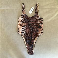 Fun Tiger Print Swimsuit Nwt Hygienic Liner Still In Place Brown One-piece Swimwear For Party, Sleeveless Brown Swimwear For Party, Brown Sleeveless Swimwear For Party, Summer Brown Stretch Bodysuit, Brown Stretch Summer Bodysuit, Brown Sleeveless Party Swimwear, Party Stretch Brown Swimwear, Brown Stretch Swimwear For Party, Fitted Tiger Print Swimwear For Summer