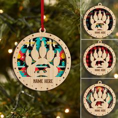 three wooden ornaments hanging from a christmas tree