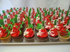 cupcakes decorated with red and green frosting