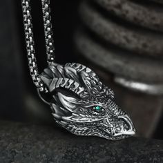 Captivating and intriguing, this grisly silver dragon pendant is one of a kind. Silver dragons...