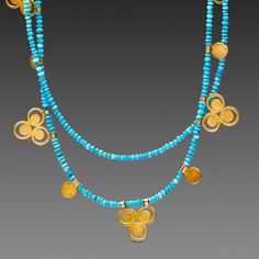 Two delicate strands of vibrant turquoise heishi beads are accented with 22k gold filigree trios and single 22k gold disks. 16 inch length shown on model. Matte finish. Also available with lapis or coral heishi beads. Artisan Turquoise Necklace With Polished Gold Beads, Artisan Turquoise Jewelry With Gold Beads, Turquoise Artisan Jewelry With Gold Beads, Artisan Gold Turquoise Necklace With Polished Beads, Gold Turquoise Necklace With Polished Beads, Traditional Gold Beaded Turquoise Necklace, Turquoise Bead Necklaces, Gold Disc, Heishi Beads