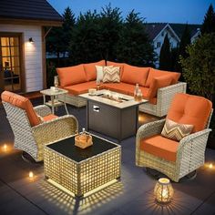 an outdoor patio with wicker furniture and lights