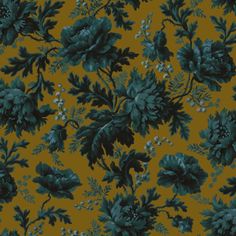 a green and blue flower pattern on a yellow background