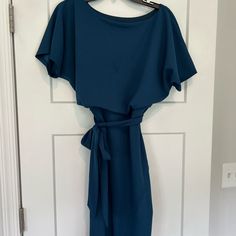 Teal Dress With Belt Never Worn Size Medium Blue Belted Maxi Dress For Party, Blue Short Sleeve Belted Midi Dress, Blue Belted Short Sleeve Dress, Blue Belted Midi Dress With Short Sleeves, Blue Tie Waist Midi Evening Dress, Blue Belted Short Sleeve Maxi Dress, Blue Tie Waist Dress For Formal Occasions, Elegant Blue Belted Mini Dress, Blue Tie Waist Midi Dress For Formal Occasions