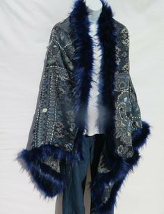 Unique Himalayan Yak/Sheep Wool Blend & Faux Fur Cape/Shawl/Wrap !!!…Ideal Unique Handcrafted gift for you, family, your friends and co-workers…!!! Handloomed/Handcrafted by Artisans Hand Embroidery Stitched Accents that Emphasize the Patterns in the Shawl Design,  Boiled Himalayan Yak/Sheep Wool Blend Shawl Handmade in Nepal Faux Fur | Black & Navy Tribal Design and Pattern A solid color Yak & Sheep Wool Blend of yarns hand loomed shawl in Nepal is handcrafted by a tribal family pattern and Ful Traditional Blue Poncho, Traditional Blue One-size Poncho, Traditional Blue Shawl For Fall, Blue One Size Shawl For Winter, Blue One-size Winter Shawl, Handmade Blue Shawl For Winter, Blue Shawl Wrap, Embroidered One Size Winter Shawl, One Size Embroidered Winter Shawl