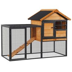 a small wooden chicken coop with a ramp and stairs to the top, in front of a white background