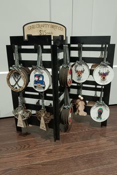 there are many ornaments hanging from the rack on the floor in front of the door