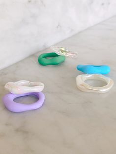 Sold as a set of two bands. These super fun rings feature one soft touch, matte wavy band as well as a clear or opalescent wavy band. With tons of different colors to choose from these rings mix and match to go with every outfit! One of my favorite trends for spring & summer are these fun and colorful plastic rings! Currently rings are only available in a US size 6 Fun Rings, Wavy Ring, Plastic Rings, Plastic Ring, Rings Cool, Cute Rings, Green Item, Clear Plastic, Neon Green