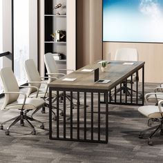 an empty conference room with chairs and a table in front of a projector screen