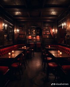 a dimly lit dining room with red velvet booths and candles on the tables in front of bookshelves