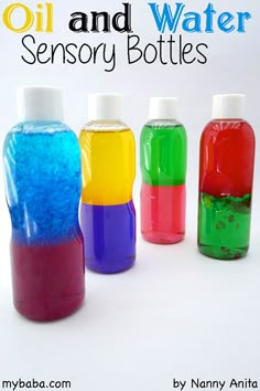 four bottles with different colored liquids in them and the words oil and water sensory bottles