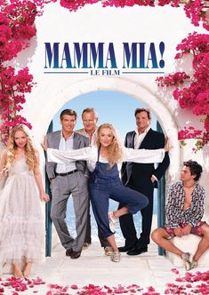 the cast of mamma mia is posing for a photo in front of pink flowers