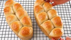 two pieces of bread sitting on top of a cooling rack