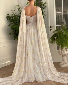 White Gilded Lily Gown | Teuta Matoshi White And Gold Gown, Long Gathered Skirt, Gilded Lily, Long Flowy Dress, White Flowy Dress, White Gold Dress, Wedding Dress Flowy, Wedding Dress Shoes, White Chiffon