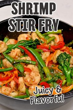 Shrimp stir fry in a large pan.