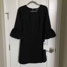 Nwt-Nina Leonard Black Dress With Gold Zipper Detail On The Back. 3/4 Sleeves With Tulip Sleeve. Very Well Made And Has Some Stretch To The Fabric As Well Size: M Bust: 19.5in Shoulder To Hem: 36in Black 3/4 Sleeve Dress For Brunch, Black Bell Sleeve Dresses For Spring, Black Bell Sleeve Dresses For Fall, Black Midi Dress With 3/4 Sleeves For Office, Casual Black Bell Sleeve Dress, Casual Black Dress With Bell Sleeves, Black Midi Dress With 3/4 Sleeve For Spring, Black Midi Dress With 3/4 Sleeve, Shift Dress With Half Sleeves For Work