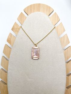 Our Orla Window Necklace features an intricately framed shimmering mother-of-pearl pendant on a lustrous 18kt matte gold plated chain. Simply beautiful with any outfit. A classic you will be pulling out of your jewelry case again and again. DETAILS Lobster closure Semi-Precious Mother-of-pearl, glass crystals 18kt matte gold plated Length: 18'' L with 2'' extension Square Pearl Pendant Necklace As Gift, Pearl Pendant Necklace With Square Shape For Gifts, Gift Pearl Pendant Necklace With Square Shape, Square Pearl Pendant Necklace For Gifts, Chic Pearl Pendant Jewelry As A Gift, Elegant Mother Of Pearl Shell Pendant Necklace, Gold Square Pearl Pendant Jewelry, Gold Square Pendant Jewelry With Pearl, Adjustable Pendant Shell Necklace As Gift