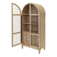 an arched wooden cabinet with drawers and mirror