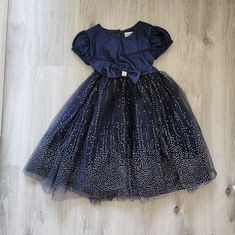 New Navy Partydress Size 6. Never Worn. Blue Holiday Party Dress, Blue Princess Dress For Holiday Party, Blue Princess Style Party Dress, Blue Holiday Dress For Fancy Dress Occasions, Blue Holiday Dress For Fancy Occasions, Elegant Blue Holiday Princess Dress, Blue Holiday Fancy Dress, Blue Princess Dress For Party Season, Blue Princess Dress For Party