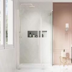 a bathroom with pink walls and white flooring next to a walk - in shower