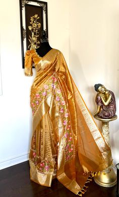 *Premium Collection* Banarasi  tissue saree with self weaving with beautifully embroidered boarder all over the saree in Golden shade rich weaving ready Blouse Rich contrast weaving Pallu  ready to wear blouse with 32-46 blouse beautifully done with lace Festive Paithani Silk Pre-draped Saree With Resham Embroidery, Transitional Gold Banarasi Silk Pre-draped Saree, Gold Embroidered Art Silk Pre-draped Saree, Gold Handloom Dola Silk Pre-draped Saree, Gold Banarasi Silk Pre-draped Saree With Pallu, Pre-draped Tissue Silk Saree With Zari Weaving, Banarasi Silk Pre-draped Saree With Zari Weaving, Gold Art Silk Pre-draped Saree With Resham Embroidery, Gold Paithani Silk Pre-draped Saree