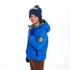 Stay warm and stylish with the SpongeBob Reversible Puffer Jacket from the SpongeBob SquarePants™ x Andy & Evan® Collab! This versatile jacket features two looks in one. One side showcases a colorful collage of all your favorite Bikini Bottom characters, including SpongeBob, Patrick, Squidward, Mr. Krabs, and more, in a fun mix of expressions and poses. The other side is a sleek, solid blue for a sportier look. Perfect for chilly days, this puffer jacket combines playful design with practical wa Playful Winter Outerwear With Pockets, Playful Fall Outdoor Outerwear, Playful Hooded Outerwear For Cold Weather, Playful Hooded Winter Outerwear, Playful Winter Outerwear For Outdoor, Hooded Winter Outerwear For Playwear, Playful Hooded Outerwear For Outdoor Activities, Reversible Winter Outerwear For Outdoor, Casual Blue Puffer Jacket With Fleece Lining