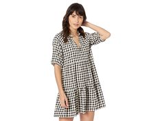 BB Dakota by Steve Madden Picnic Ready Dress - Women's Dress : Black : Relish the cheerful moments on your family picnic wearing this comfy BB Dakota x Steve Madden Picnic Ready Dress. V-neckline with ruffled detailing. Puff sleeves. Tiered detailing. Allover gingham pattern. Pull-on style. 80% polyester, 20% rayon. Hand wash, dry flat. Imported. Measurements: Length: 34 in Product measurements were taken using size SM (US 4). Please note that measurements may vary by size. Casual V-neck Dress For Picnic, Casual Fall Picnic Dresses, Casual Gingham Dress With Short Sleeves, Gingham V-neck Dress With Ruffles, Gingham V-neck Dress For Vacation, Family Picnic, Gingham Pattern, Bb Dakota, Relish