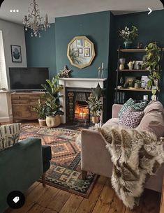 a living room filled with furniture and a fire place