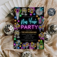 new year's eve party flyer with disco balls and confetti in the background