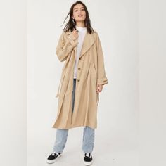 Free People Eastwick Trench Beige Md (Women's 8-10) Condition Is New With Tags. Measurements Length Size 51 Inches A Contemporary Twist On A Classic Trench Coat. Features An Oversized, Relaxed Silhouette. Waist Tie Detail And Button Detailing At Back For Added Dimension. Oversized Cloverleaf Collar. 100% Nylon. Machine Wash Cold. Beige Relaxed Fit Outerwear For Fall, Classic Relaxed Fit Outerwear, Oversized Taupe Outerwear For Fall, Taupe Outerwear For Work, Spring Neutral Relaxed Fit Outerwear, Everyday Taupe Outerwear For Fall, Taupe Outerwear For Everyday Fall Wear, Chic Beige Outerwear For Everyday, Long Duster Coat