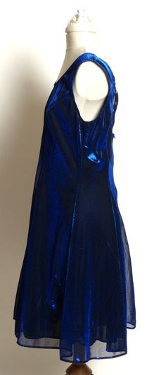 "This cocktail dress is created with a gorgeous velvet fabric in a rich cobalt blue with just enough stretch to hug you without being too revealing. The back has wonderful detailing - a spider web of straps gathered together in the center with a sparkling rhinestone bar. Very wearable size 12. In excellent condition. Measurements are approximate: Bust - 38\", Waist - 28-30\", Hips - 36-38\". The length of the dress from shoulder to hemline is 35\"" Elegant Blue Mini Dress For Costume Party, Blue Fitted Velvet Party Dress, Blue Velvet Evening Dress, Seed Bead Purse, White Vans, Great Falls, Rhinestone Dress, Beaded Purses, Blue Velvet