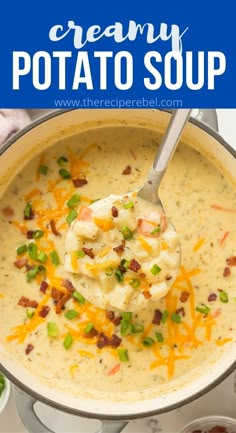 creamy potato soup in a pot with a spoon